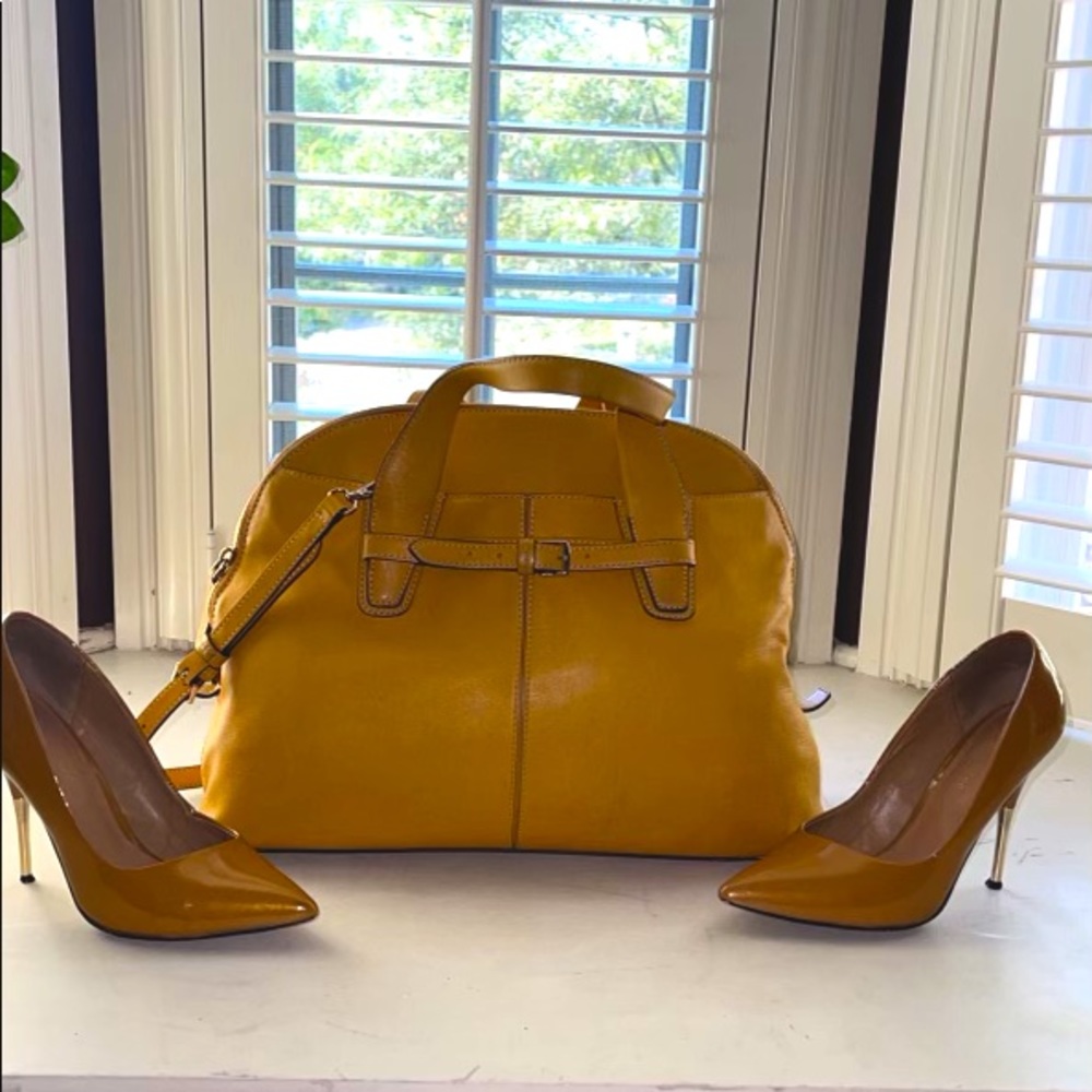 Tumi mustard purse